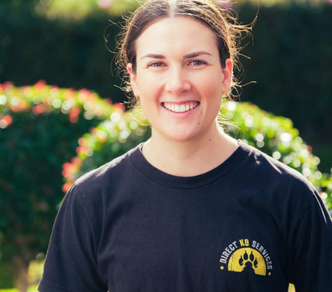 Professional dog trainer Grace. Grace is a foundation member of the Direct K9 team and she provides specialist training in behaviour and puppy development